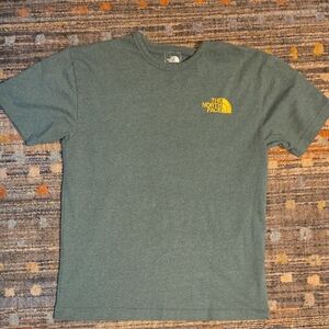 The North Face Heather Green graphic tee.